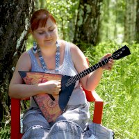 Hráčka na balalajku – stafichukanatoly/Pixabay.com