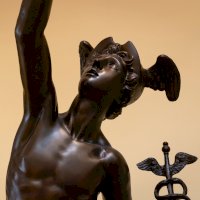 Detail sochy boha Merkura – Photo by Jon Butterworth on Unsplash