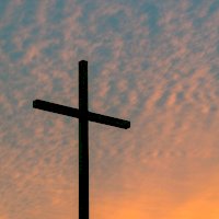 Symbol kříže – Photo by Aaron Burden on Unsplash
